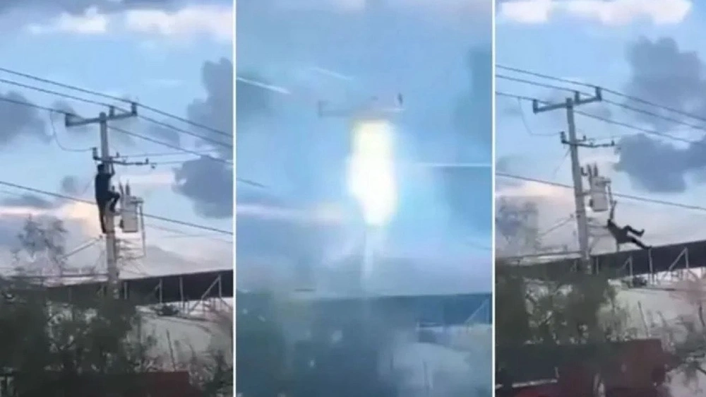 صعقة كهربائية تسقط لصاً فوق سيارة شرطة