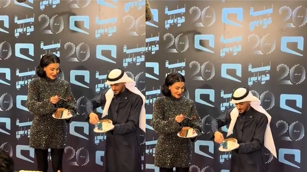 أميمة طالب وعايض يوسف يتبادلان الكيك في لقطة عفوية.. فيديو