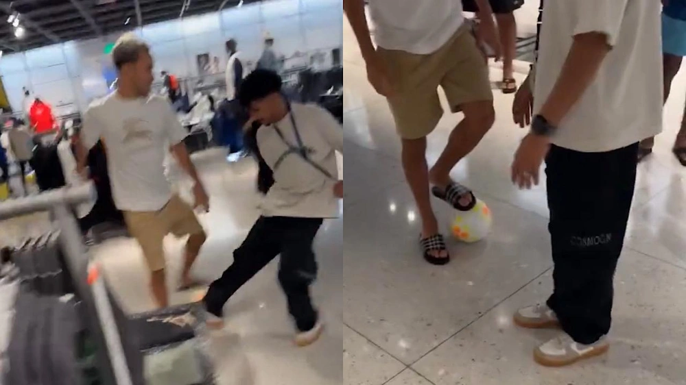 بينتو ماثيوس يلاعب أحد العاملين في متجر نايكي في أجواء حماسية