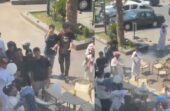 أب يحتفل بتخرج ابنه من الروضة .. فيديو